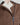 Chaqueta de cordero con detalles en contraste — detalle